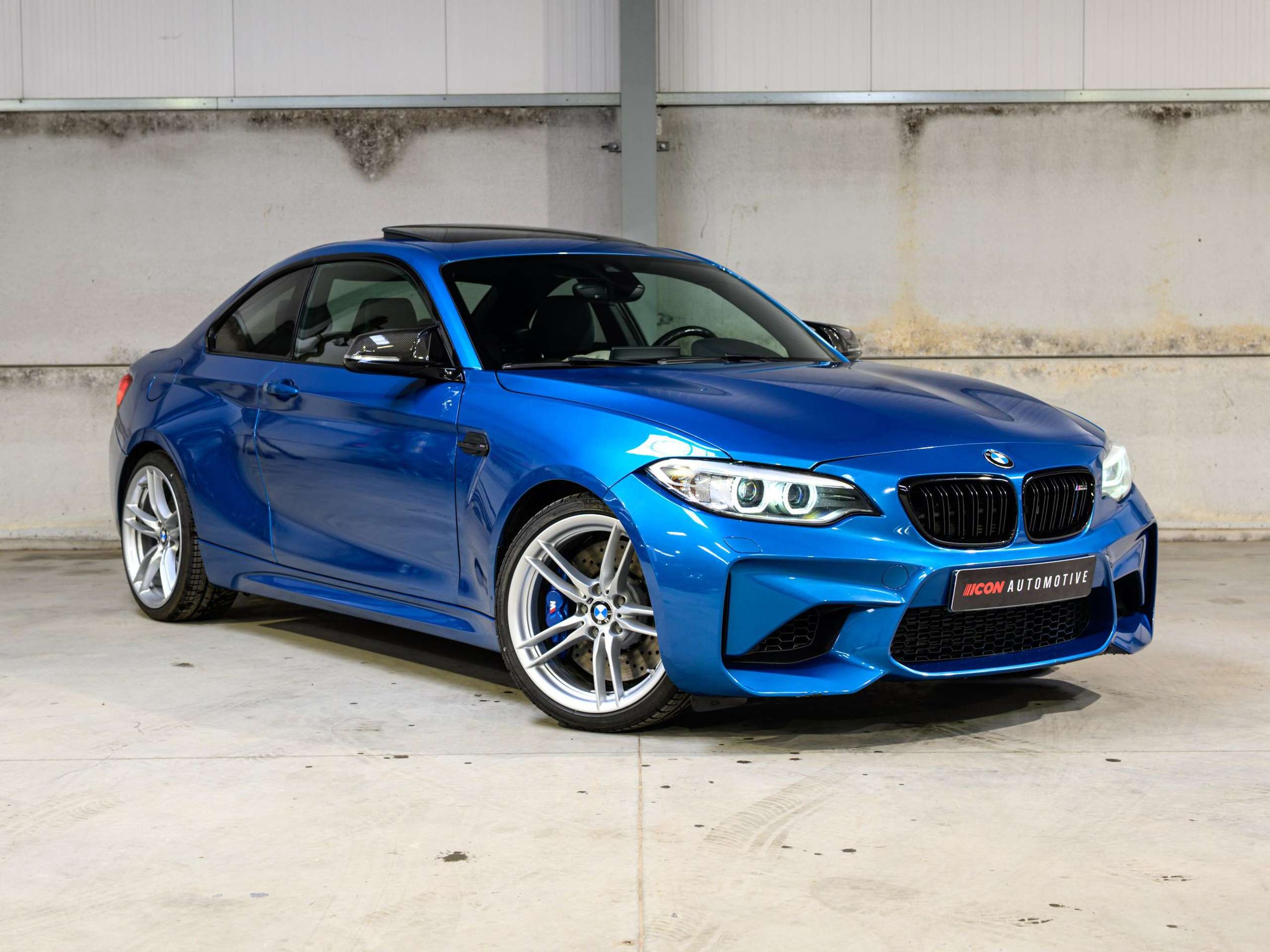 b7eeb420-9c62-46e4-a0af-fc30fdd80a3c1-bmw-m2-f87-dkg-navpro-carbon-pano-harman-kardon.jpg