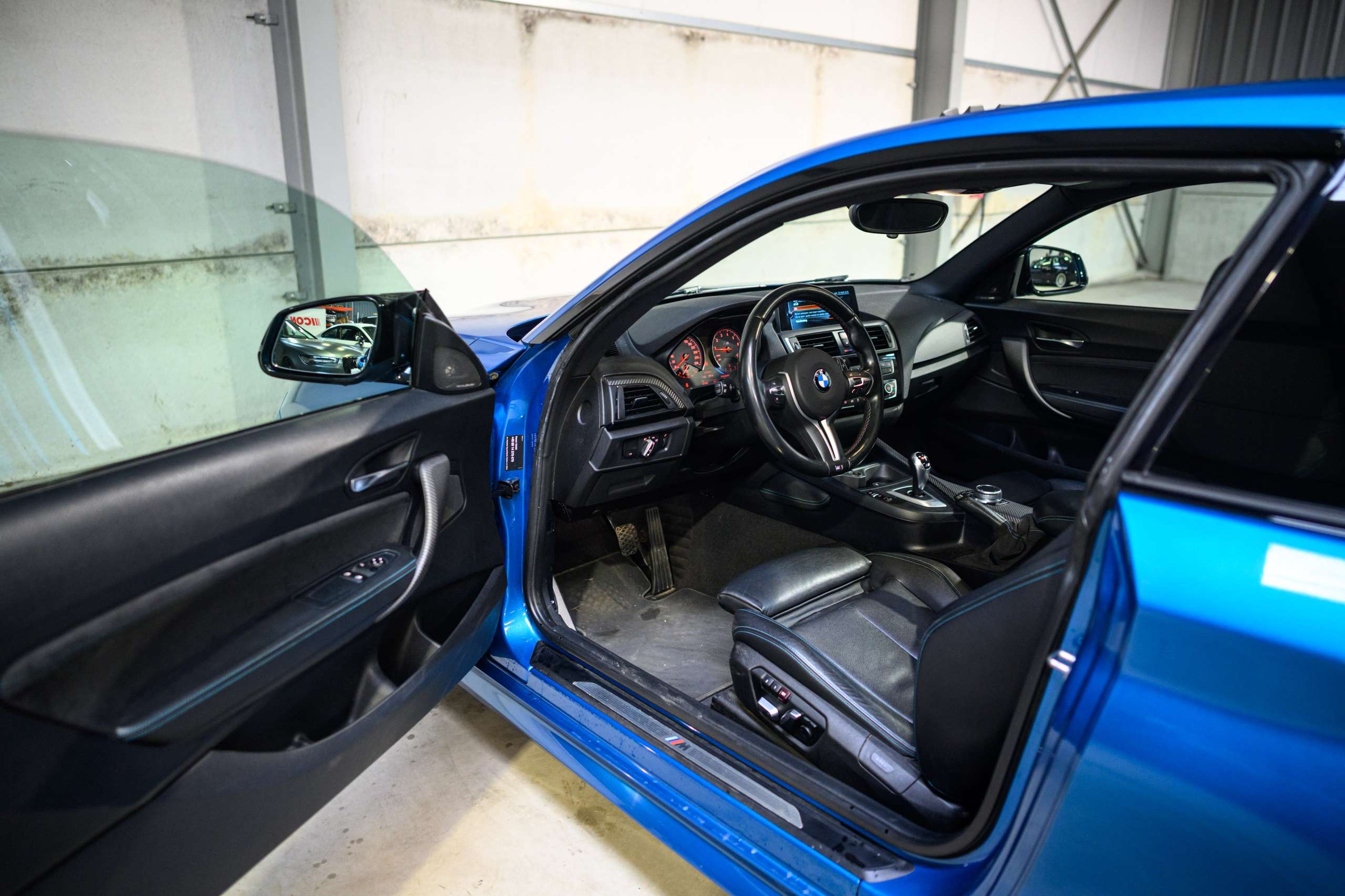 b7eeb420-9c62-46e4-a0af-fc30fdd80a3c12-bmw-m2-f87-dkg-navpro-carbon-pano-harman-kardon.jpg
