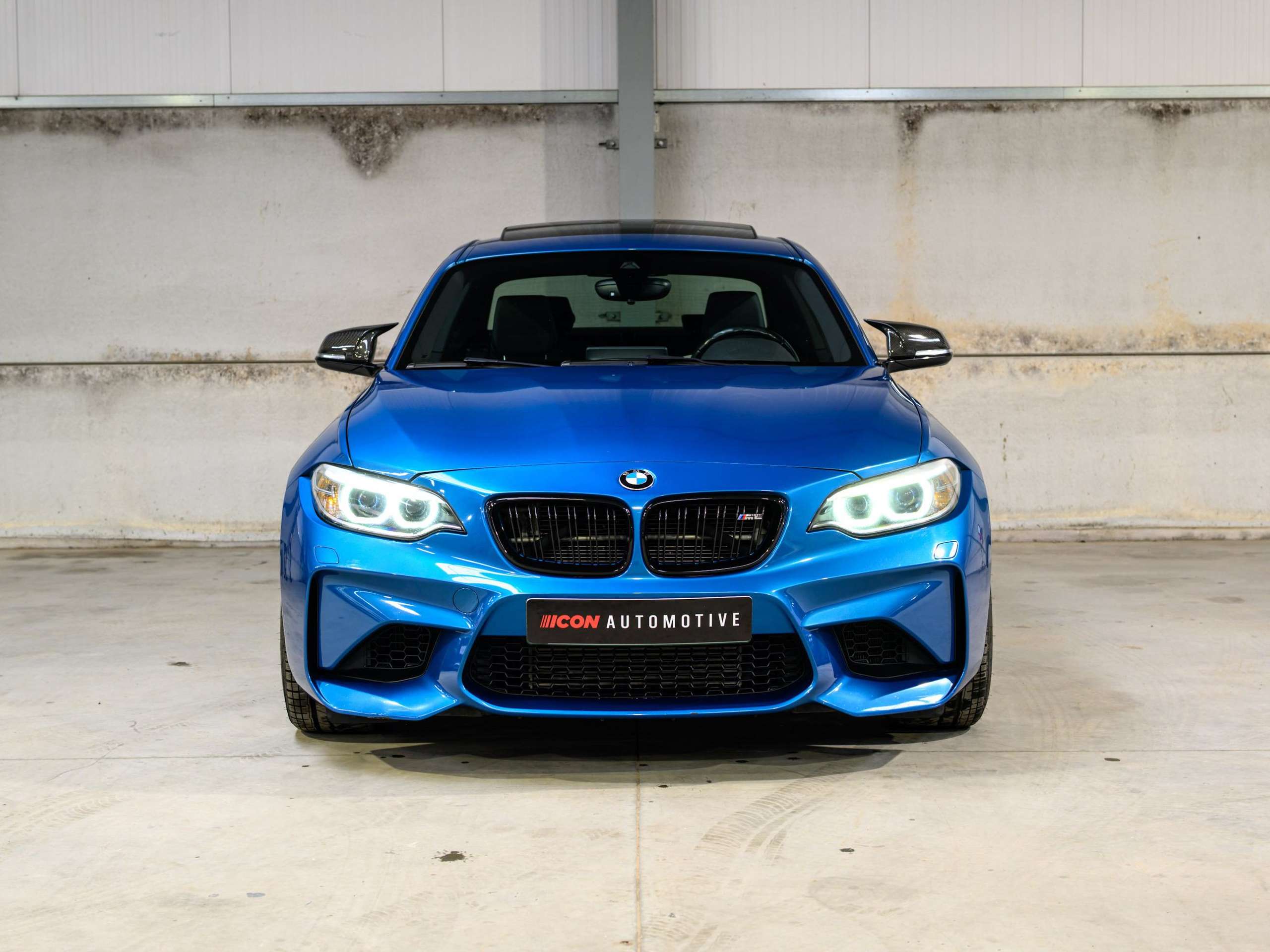 b7eeb420-9c62-46e4-a0af-fc30fdd80a3c2-bmw-m2-f87-dkg-navpro-carbon-pano-harman-kardon.jpg