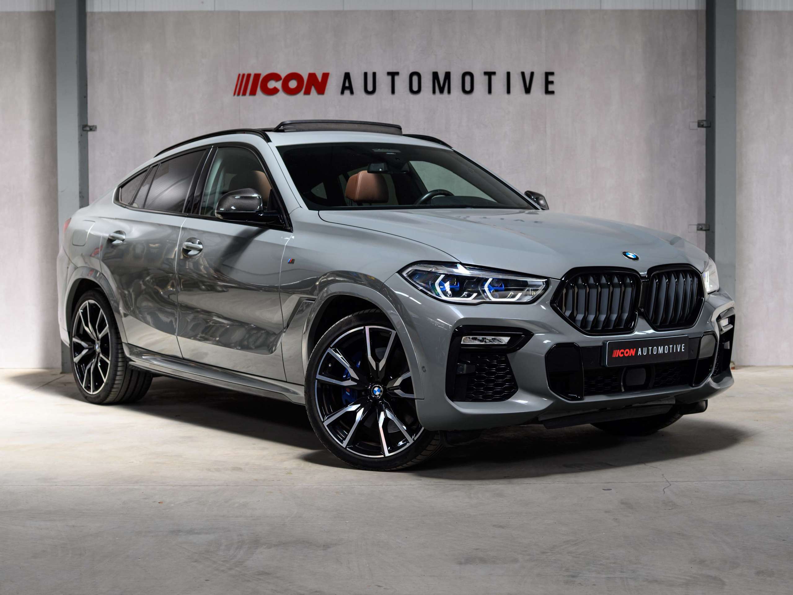 28222fdb-bf2b-436d-8002-7caad9029d191-bmw-x6-m-m50i-v8-nardo-grey-pano-sky-laser-massage.jpg