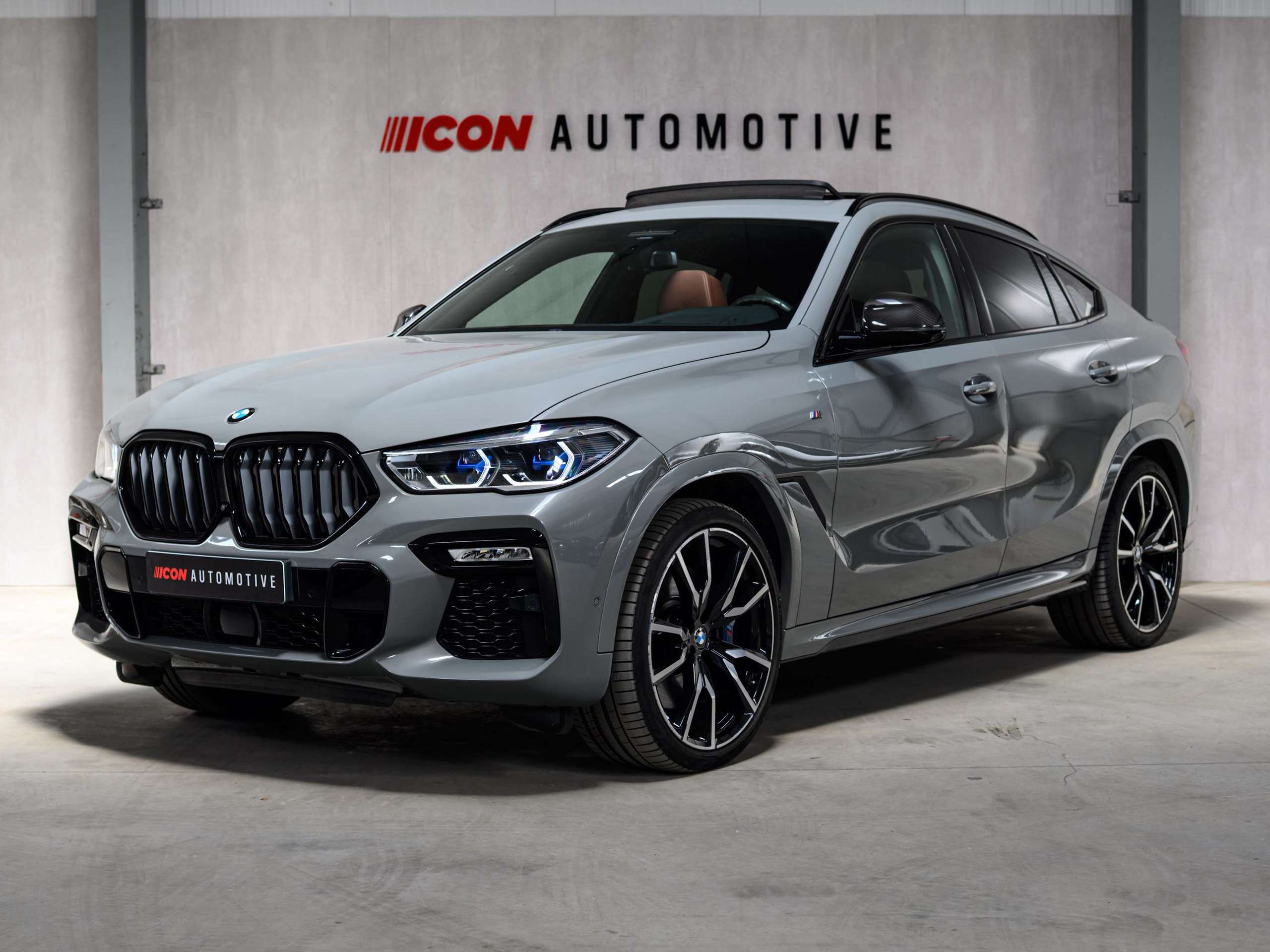 28222fdb-bf2b-436d-8002-7caad9029d193-bmw-x6-m-m50i-v8-nardo-grey-pano-sky-laser-massage.jpg
